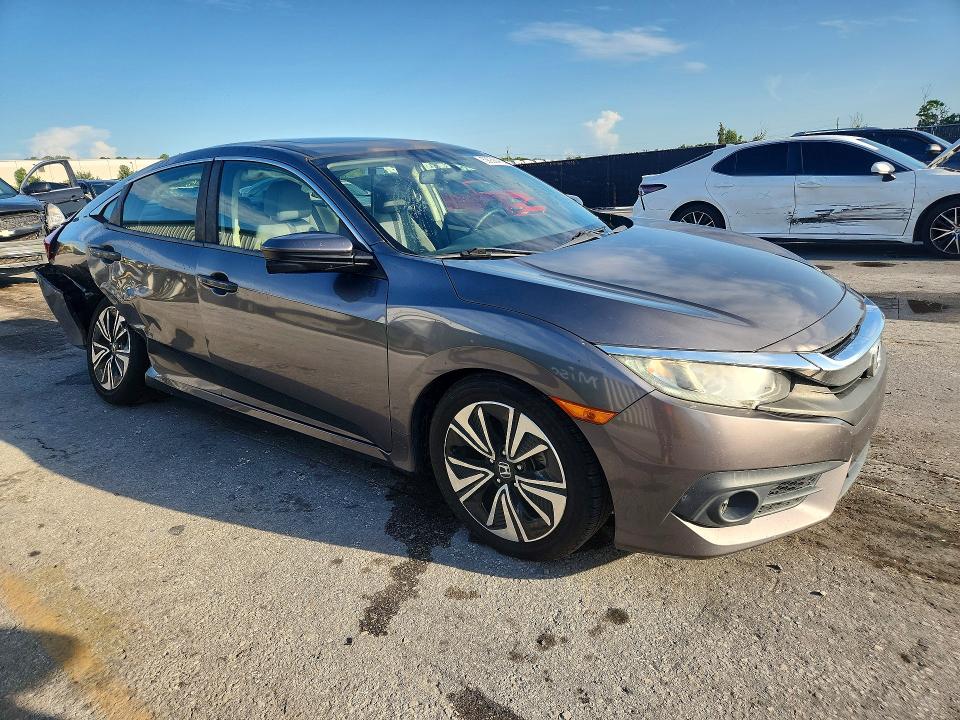 2018 Honda Civic VIN JHMFC1F31JX024260 COPART salvage auction — REAR END, Fl - Cert Of Title Slvg Rebuildable, sold $25 on 2026-07-28 (photo 4)