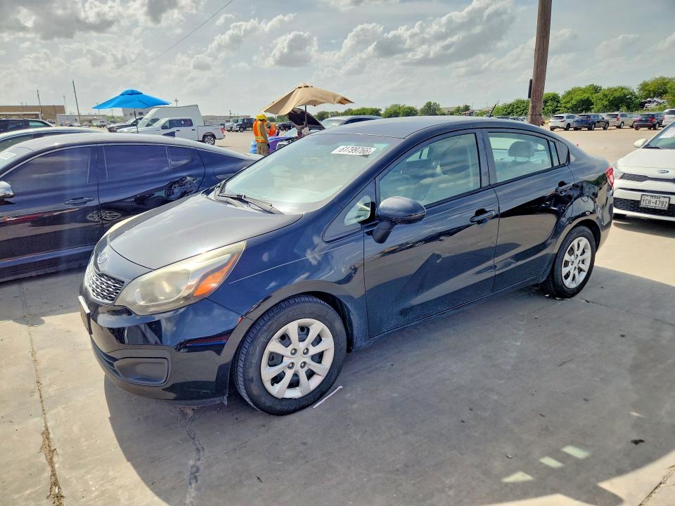 2015 Kia Rio VIN KNADM4A39F6527091 COPART salvage auction — NORMAL WEAR, Tx - Certificate Of Title, sold $975 on 2026-07-30 (photo 1)