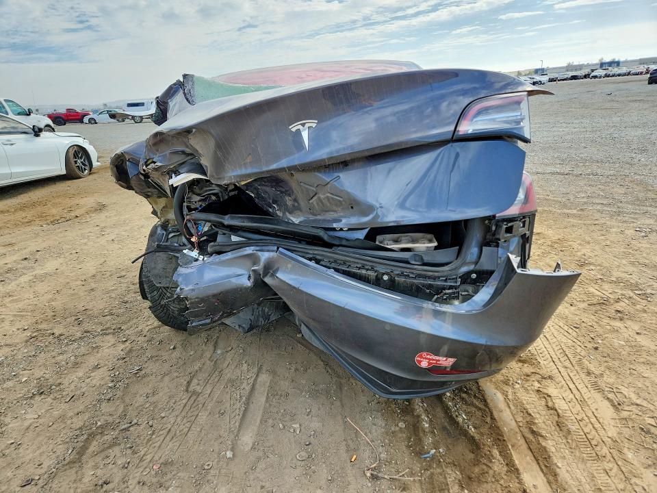 2017 Tesla Model 3 VIN 5YJ3E1EA5HF001261 COPART salvage auction — REAR END, Salvage Title, sold $2,500 on 2026-09-01 (photo 6)