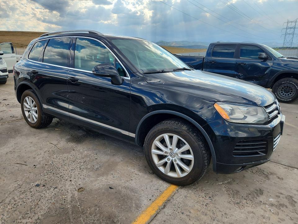 2013 Volkswagen Touareg VIN WVGEF9BP9DD011687 COPART salvage auction — FRONT END, CO - CERTIFICATE OF TITLE, sold $600 on 2026-08-05 (photo 4)