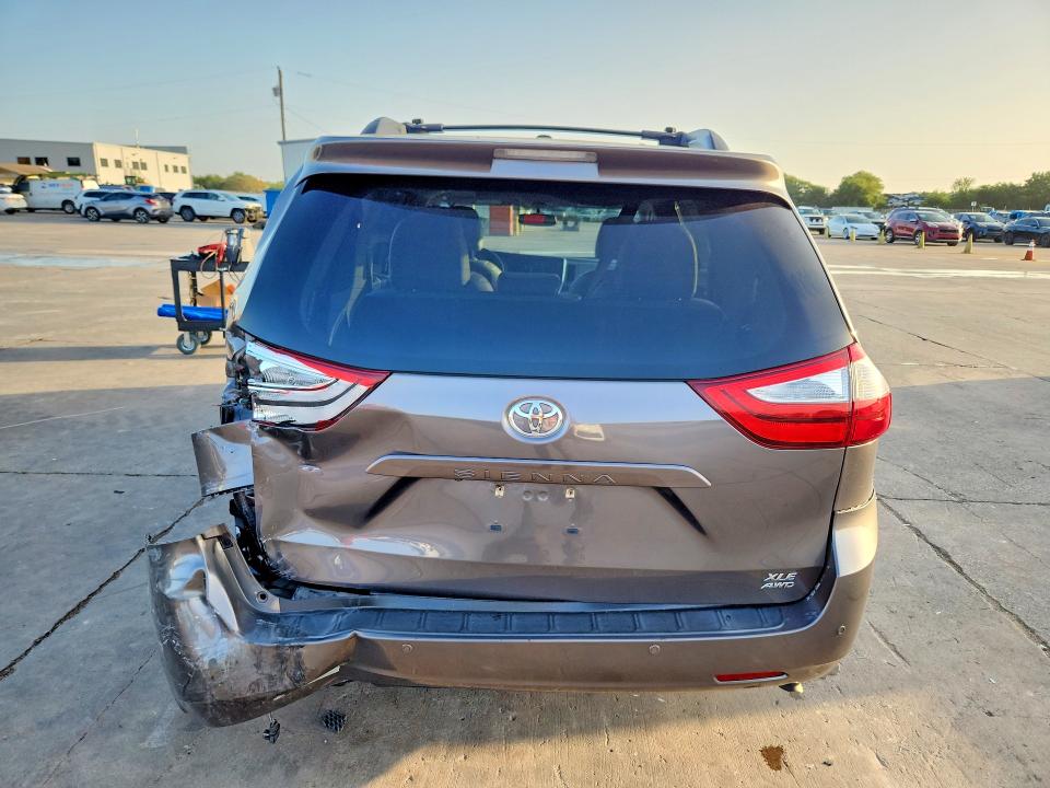 2015 Toyota Sienna VIN 5TDDK3DC5FS099146 COPART salvage auction — REAR END, TX - SALVAGE VEHICLE TITLE (P), sold $225 on 2026-07-27 (photo 6)