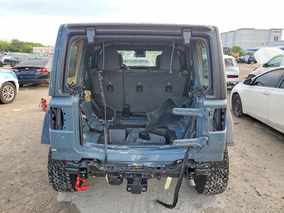 2024 Jeep Wrangler / VIN 1C4PJXFG7RW305322 COPART salvage auction — REAR END, Fl - Cert Of Title Slvg Rebuildable, sold $21,400 on 2026-08-31 (photo 6)