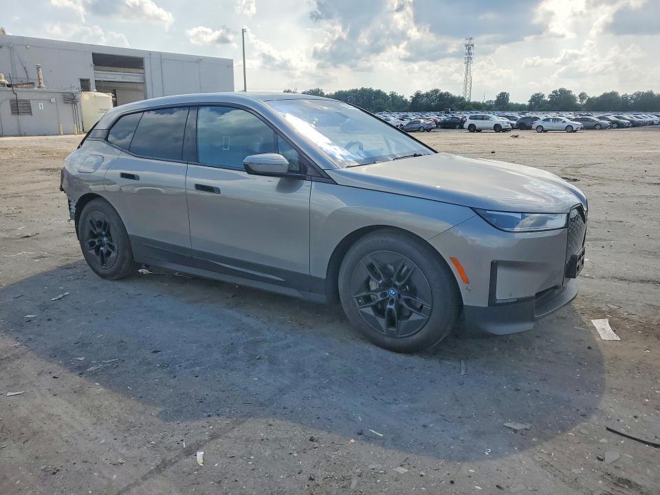2023 BMW Ix VIN WB523CF04PCM48299 COPART salvage auction — REAR END, Salvage Title, sold $24,000 on 2026-07-29 (photo 4)