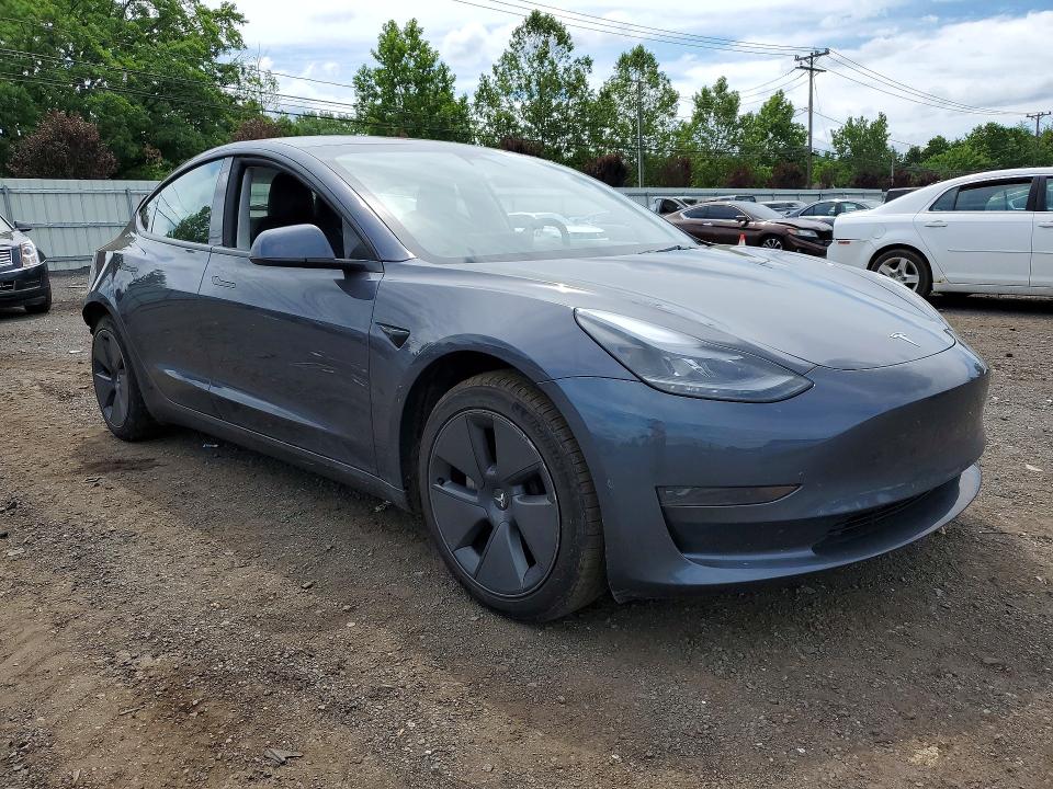 2023 Tesla Model 3 VIN 5YJ3E1EA4PF687243 COPART salvage auction — REAR END, CT - CERT OF TITLE-SALVAGE, sold $3,700 on 2026-07-28 (photo 4)