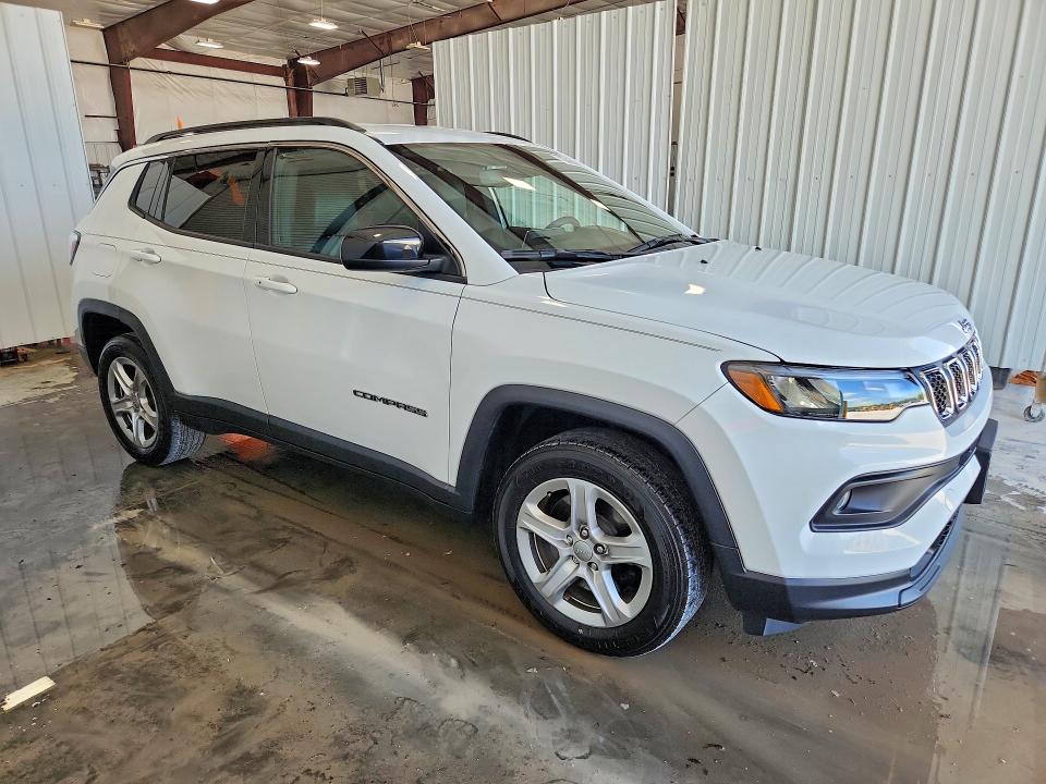 2023 Jeep Compass VIN 3C4NJDBN3PT504266 COPART salvage auction — MINOR DENT/SCRATCHES, Mo - Certificate Of Title, sold $10,300 on 2026-07-09 (photo 4)