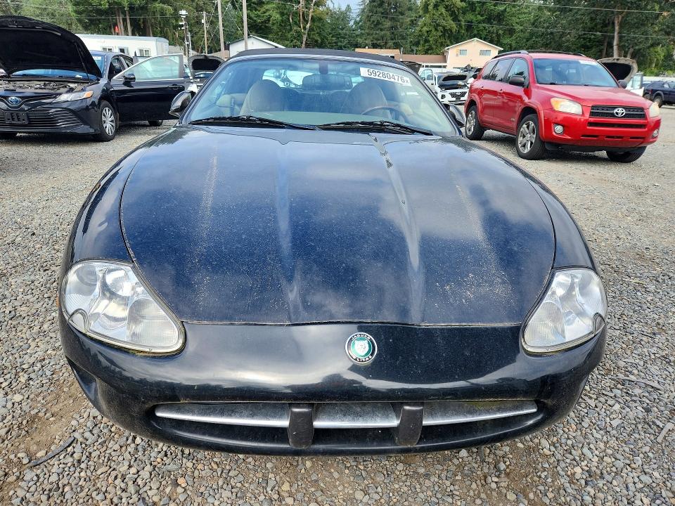 2000 Jaguar Xk series VIN SAJJA42CXYNA03622 COPART salvage auction — MINOR DENT/SCRATCHES, Wa - Cert Of Ownership-Rebuilt, sold $275 on 2026-07-21 (photo 5)