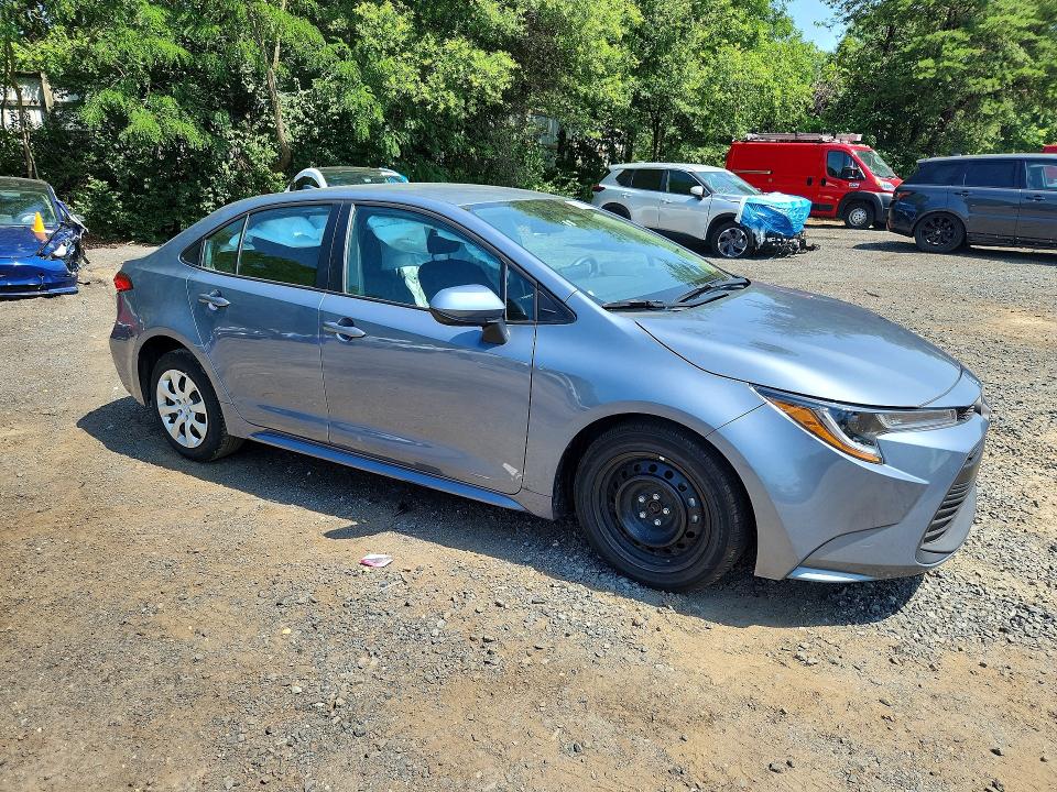 2025 Toyota Corolla VIN 5YFB4MDEXSP231457 COPART salvage auction — SIDE, FL - CERTIFICATE OF TITLE, sold $7,200 on 2026-07-20 (photo 4)