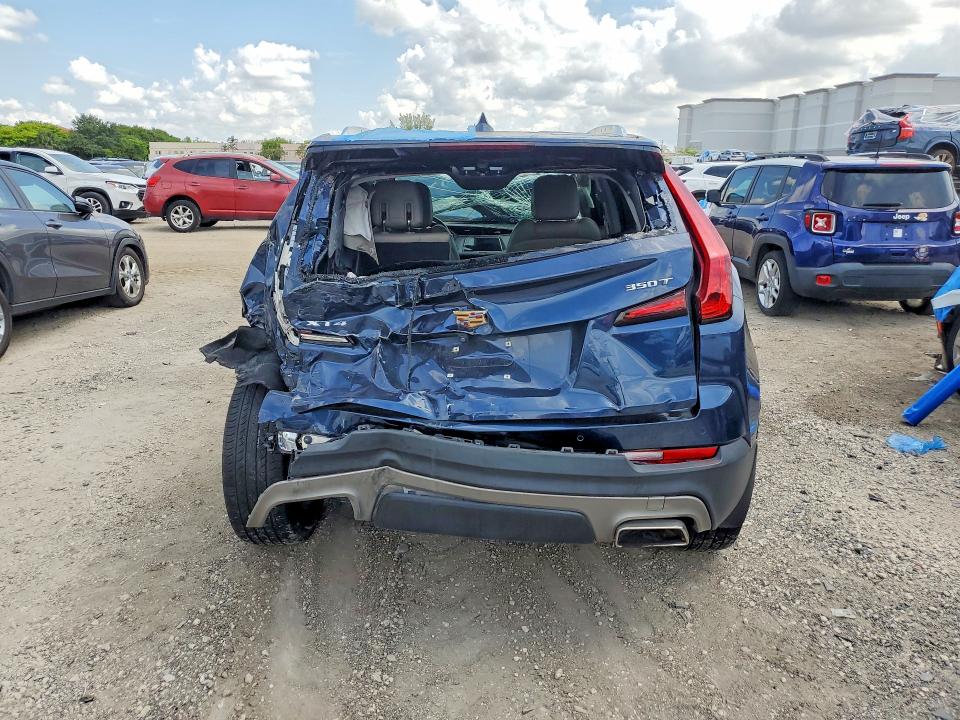 2021 Cadillac Xt4 VIN 1GYFZCR43MF028086 COPART salvage auction — FRONT END, Fl - Certificate Of Destruction, sold $2,250 on 2026-07-09 (photo 6)