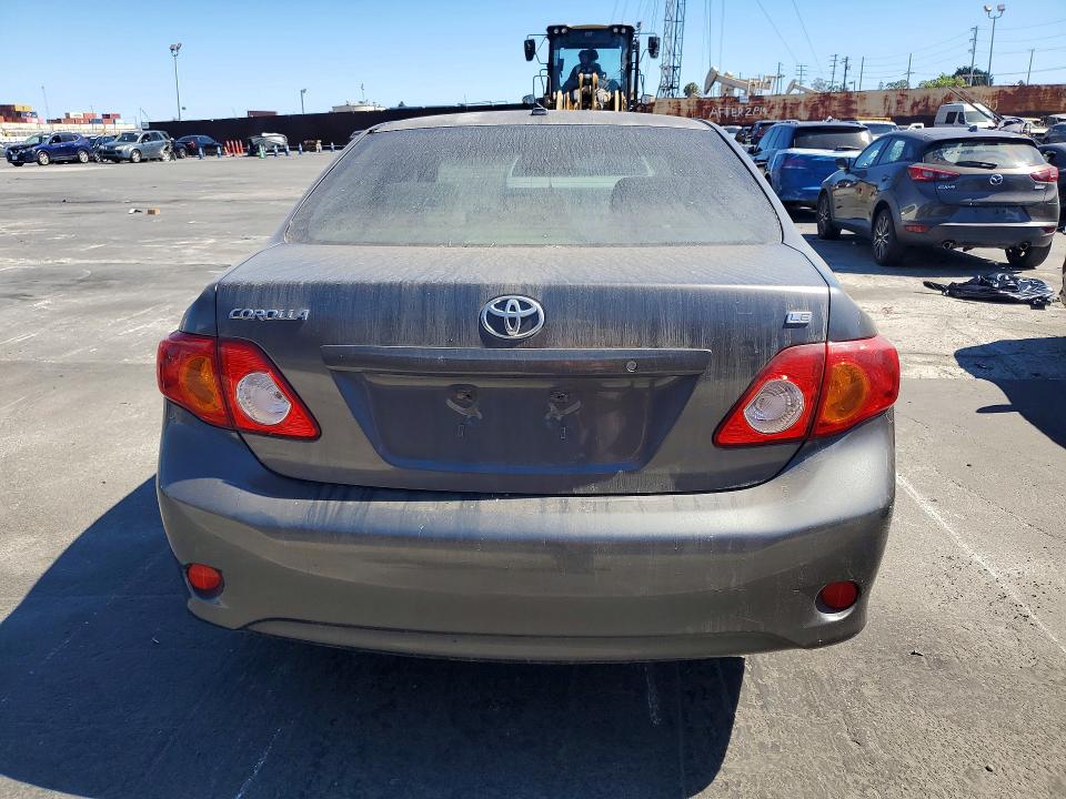 2009 Toyota Corolla VIN JTDBL40E599021289 COPART salvage auction — NORMAL WEAR, Fl - Dis/Dlr/Exp Only Clean Title, sold $2,050 on 2026-07-29 (photo 6)