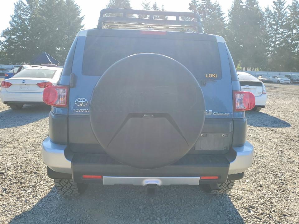 2011 Toyota Fj cruiser VIN JTEBU4BF8BK106429 COPART salvage auction — UNDERCARRIAGE, WA - BILL OF SALE, sold $10,000 on 2026-07-17 (photo 6)