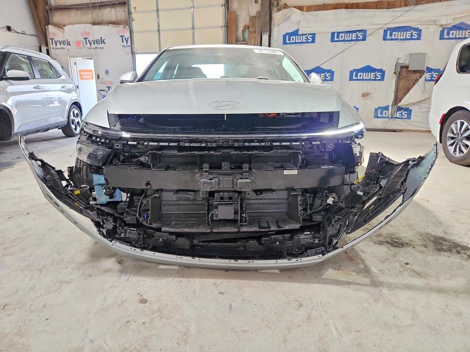 2026 Hyundai Sonata hybrid VIN KMHL24JJ3TA157974 COPART salvage auction — FRONT END, AZ - CERT OF TITLE- NON REPAIR (P), sold $7,400 on 2026-07-27 (photo 5)