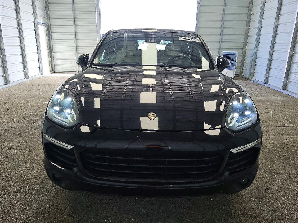 2016 Porsche Cayenne VIN WP1AA2A20GLA09219 COPART salvage auction — MINOR DENT/SCRATCHES, FL - CERTIFICATE OF TITLE, sold $7,700 on 2026-07-28 (photo 5)