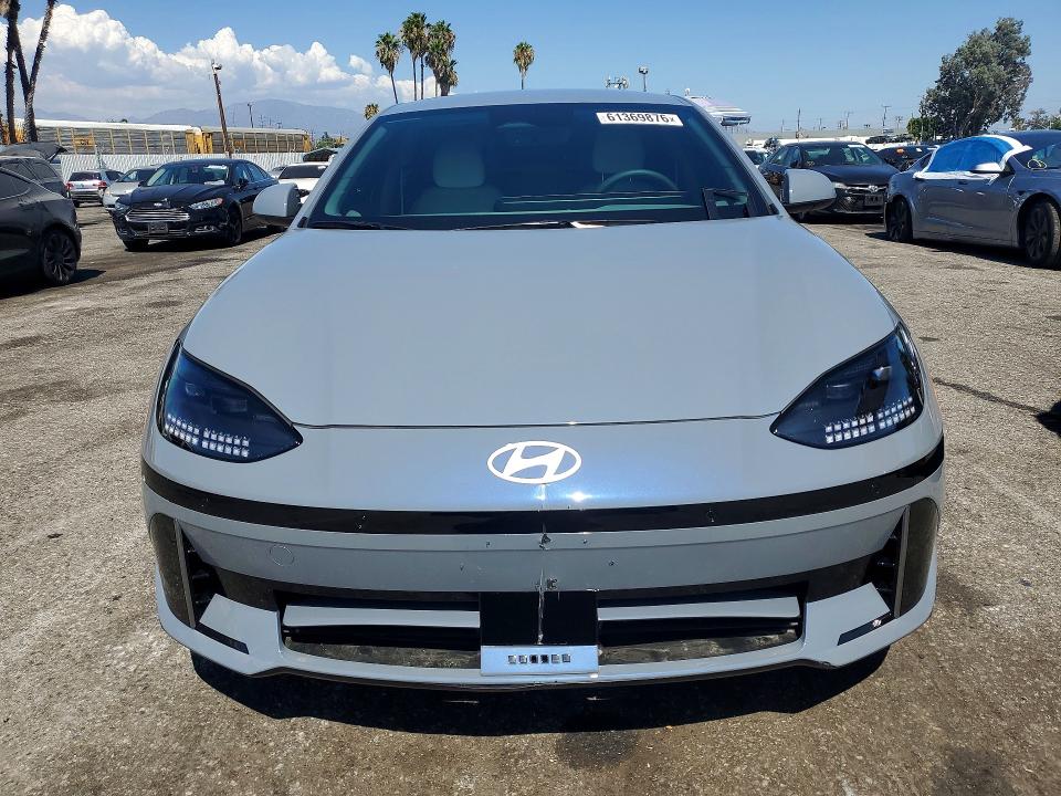 2025 Hyundai Ioniq 6 VIN KMHM34AA1SA116839 COPART salvage auction — UNDERCARRIAGE, Mi - Dis/Dlr/Exp Only Salvage Title, sold $850 on 2026-07-21 (photo 5)