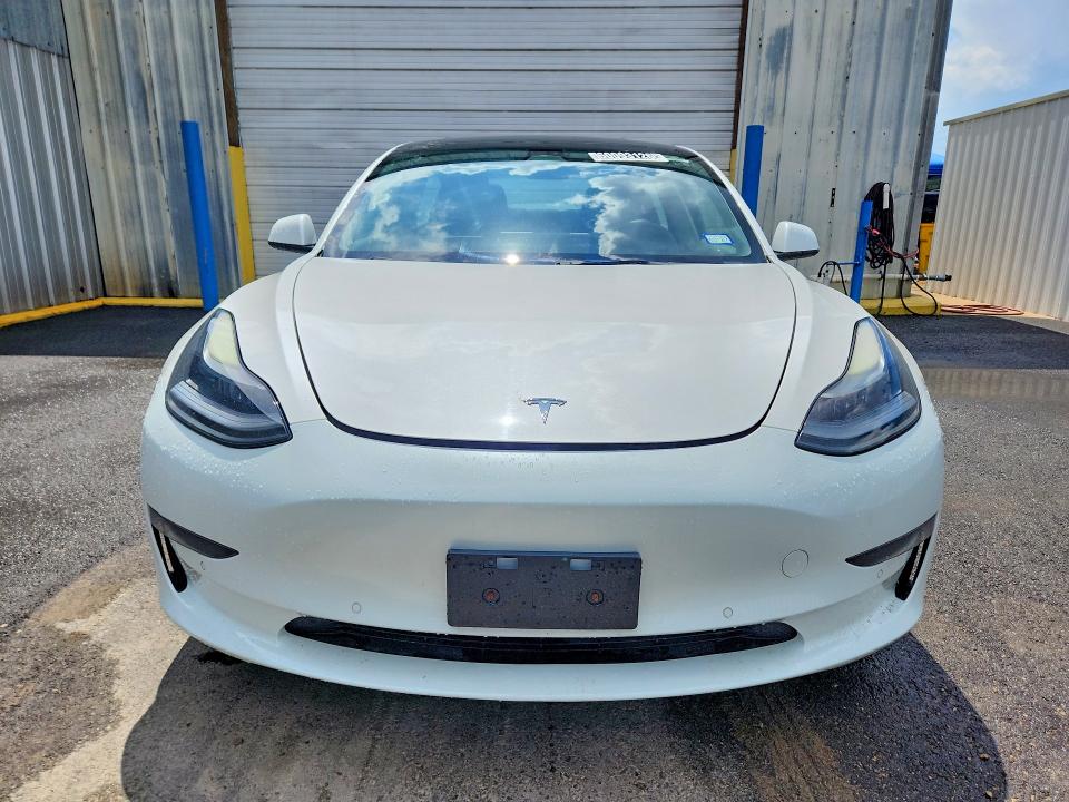 2022 Tesla Model 3 VIN 5YJ3E1EA9NF191786 COPART salvage auction — UNDERCARRIAGE, TX - CERTIFICATE OF TITLE, sold $450 on 2026-07-22 (photo 5)