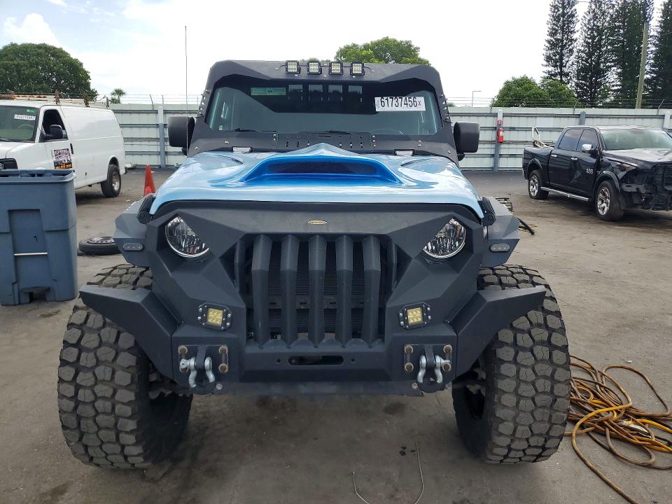 2020 Jeep Gladiator VIN 1C6HJTAG4LL215629 COPART salvage auction — NORMAL WEAR, Fl - Cert Of Title-Rebuilt, sold $15,200 on 2026-07-27 (photo 5)
