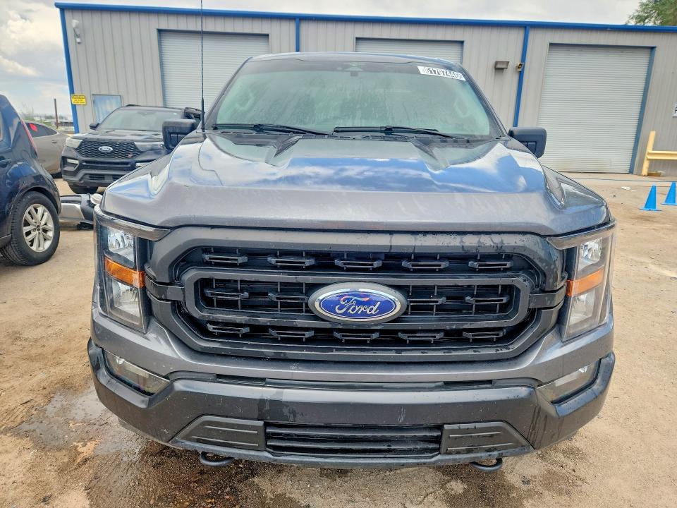 2023 Ford F-150 lightning VIN 1FTFW1E52PKF99887 COPART salvage auction — MINOR DENT/SCRATCHES, NM - CERTIFICATE OF TITLE (P), sold $28,500 on 2026-09-14 (photo 5)