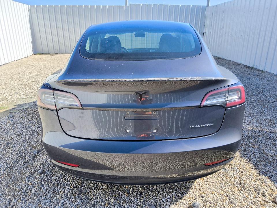 2018 Tesla Model 3 VIN 5YJ3E1EB7JF185035 COPART salvage auction — NORMAL WEAR, Fl - Certificate Of Title, sold $10,900 on 2026-07-28 (photo 6)