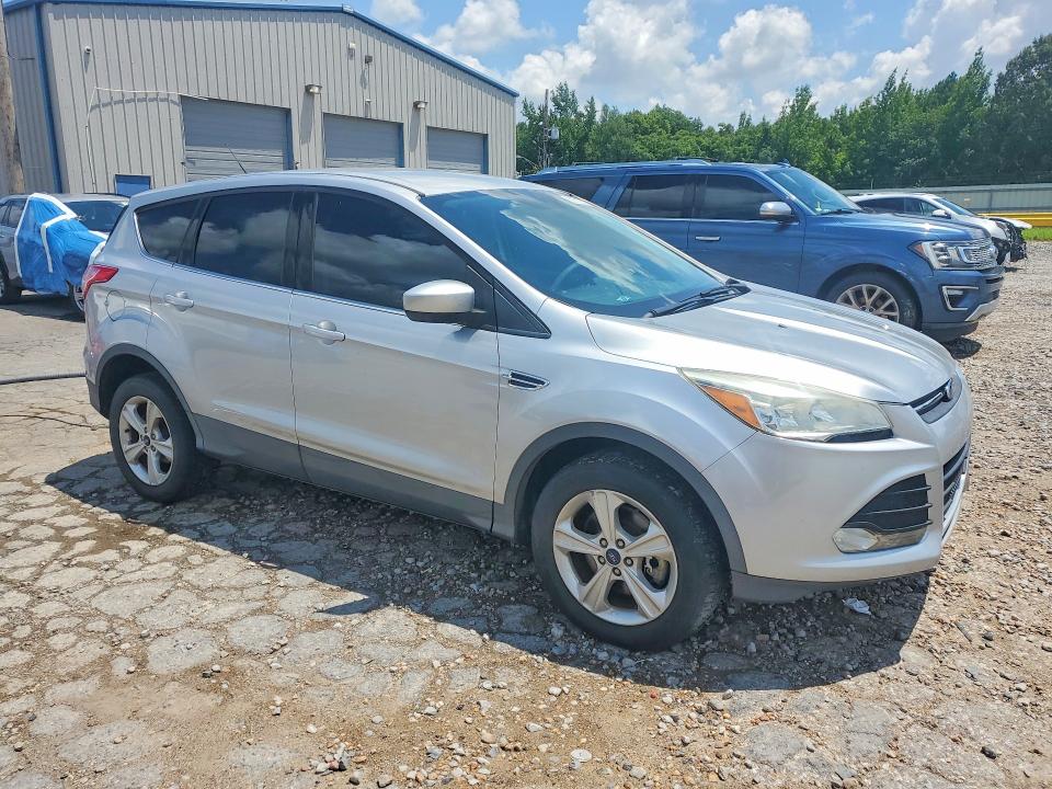 2016 Ford Escape VIN 1FMCU9GX3GUC81525 COPART salvage auction — NORMAL WEAR, Mt - Certificate Of Title, sold $1,250 on 2026-07-22 (photo 4)