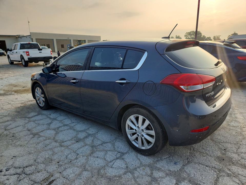 2015 Kia Forte VIN KNAFX5A83F5295031 COPART salvage auction — NORMAL WEAR, In - Certificate Of Title, sold $500 on 2026-07-31 (photo 2)