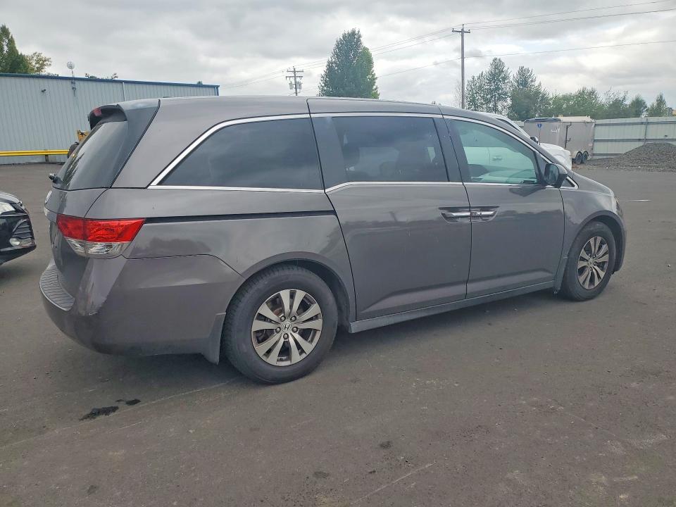 2015 Honda Odyssey VIN 5FNRL5H65FB017245 COPART salvage auction — NORMAL WEAR, Salvage Title, sold $1,050 on 2026-07-28 (photo 3)