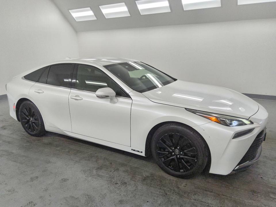 2022 Toyota Mirai VIN JTDAAAAA6NA004764 COPART salvage auction — MINOR DENT/SCRATCHES, Ca - Dis/Dlr/Exp Only Clean Title, sold $650 on 2026-07-28 (photo 4)