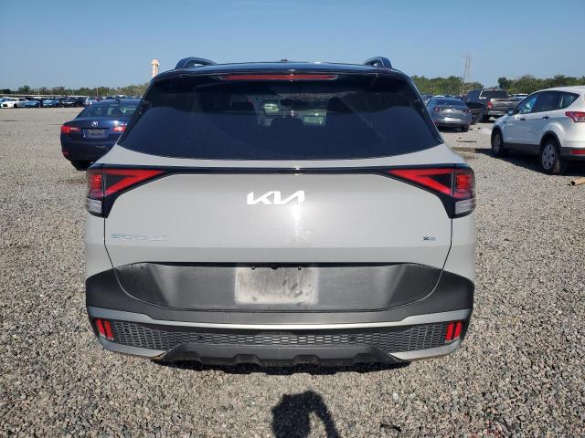 2023 Kia Sportage VIN 5XYK7CAF0PG121060 COPART salvage auction — WATER/FLOOD, Fl - Certificate Of Destruction, sold $1,900 on 2026-07-31 (photo 6)