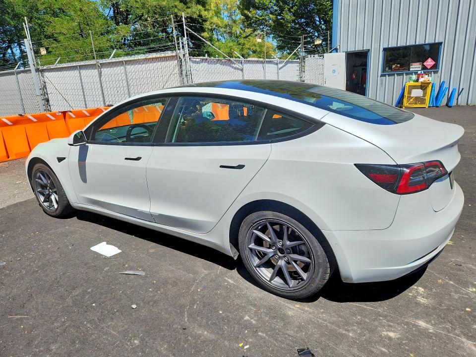 2022 Tesla Model 3 VIN 5YJ3E1EA5NF285731 COPART salvage auction — FRONT END, CA - CERTIFICATE OF TITLE, sold $250 on 2026-07-22 (photo 2)