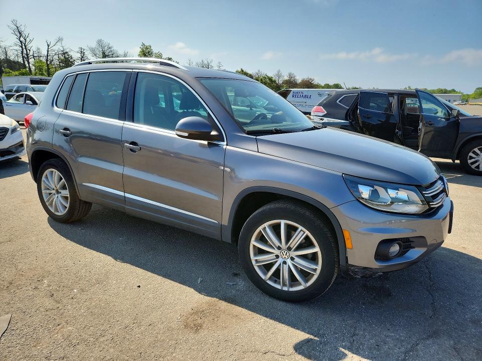 2016 Volkswagen Tiguan VIN WVGBV7AX0GW507501 COPART salvage auction — MINOR DENT/SCRATCHES, Ny - Certificate Of Title, sold $3,200 on 2026-07-15 (photo 4)