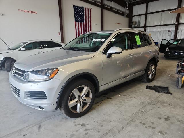 2011 Volkswagen Touareg VIN WVGFK9BP0BD002003 COPART salvage auction — FRONT END, FL - CERT OF TITLE SLVG REBUILDABLE, sold $1,900 on 2026-07-14 (photo 1)