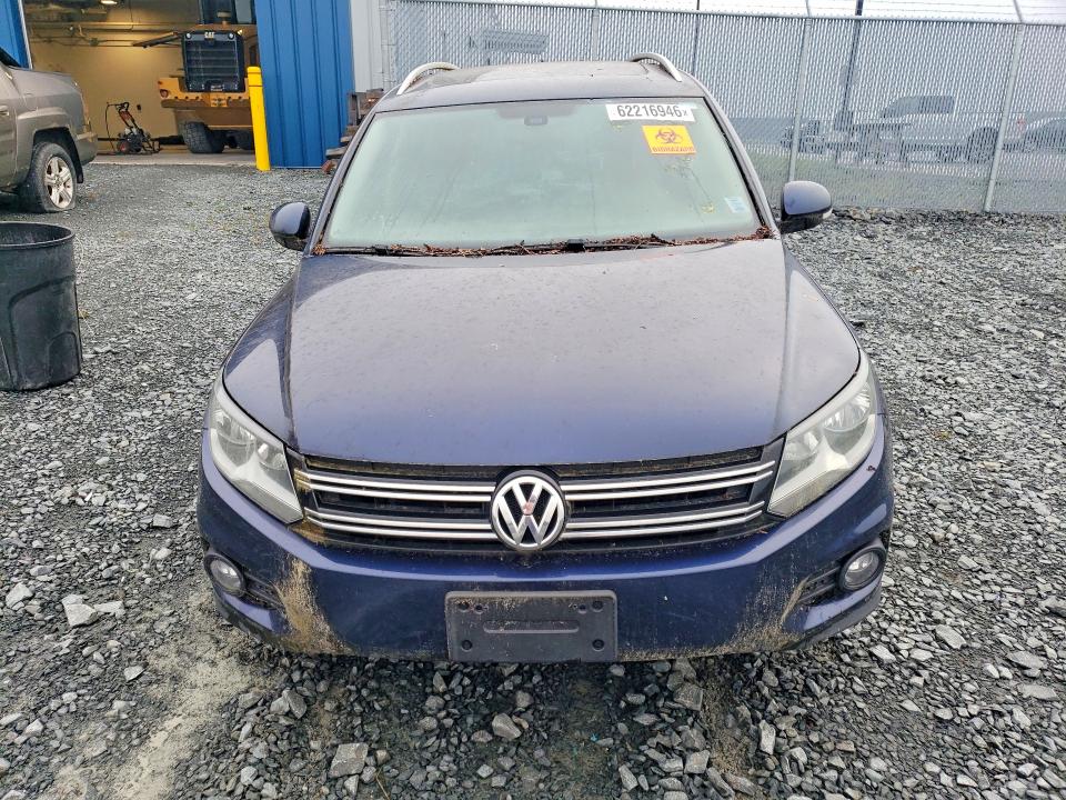 2014 Volkswagen Tiguan VIN WVGJV3AXXEW624990 COPART salvage auction — WATER/FLOOD, Ns - Cert Of Registration, sold $225 on 2026-08-13 (photo 5)