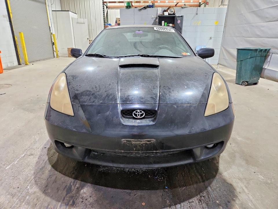 2000 Toyota Celica VIN JTDDR32T4Y0066417 COPART salvage auction — NORMAL WEAR, NH - CERTIFICATE OF TITLE, sold $300 on 2026-07-09 (photo 5)