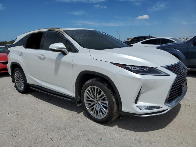 2022 Lexus Rx 350l VIN JTJJZKEA5N2026738 COPART salvage auction — INTERIOR BURN, Tx - Nonrepairable Title, sold $12,900 on 2026-07-09 (photo 4)