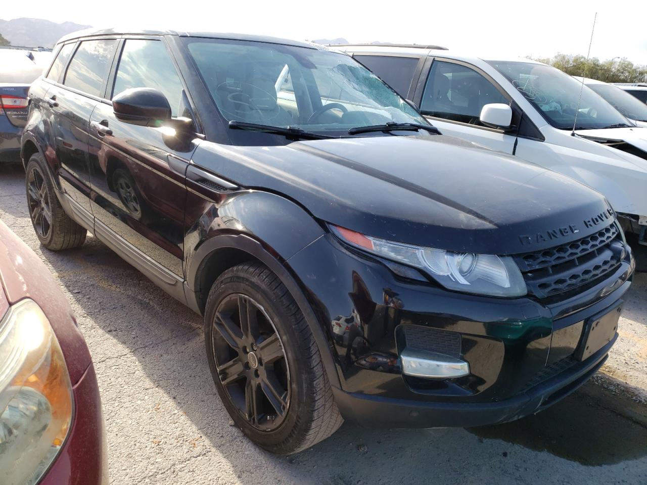 2015 Land rover Range rover evoque VIN SALVP2BG1FH014158 COPART salvage auction — VANDALISM, NV - SALVAGE TITLE, sold $2,900 on 2025-01-09 (photo 4)