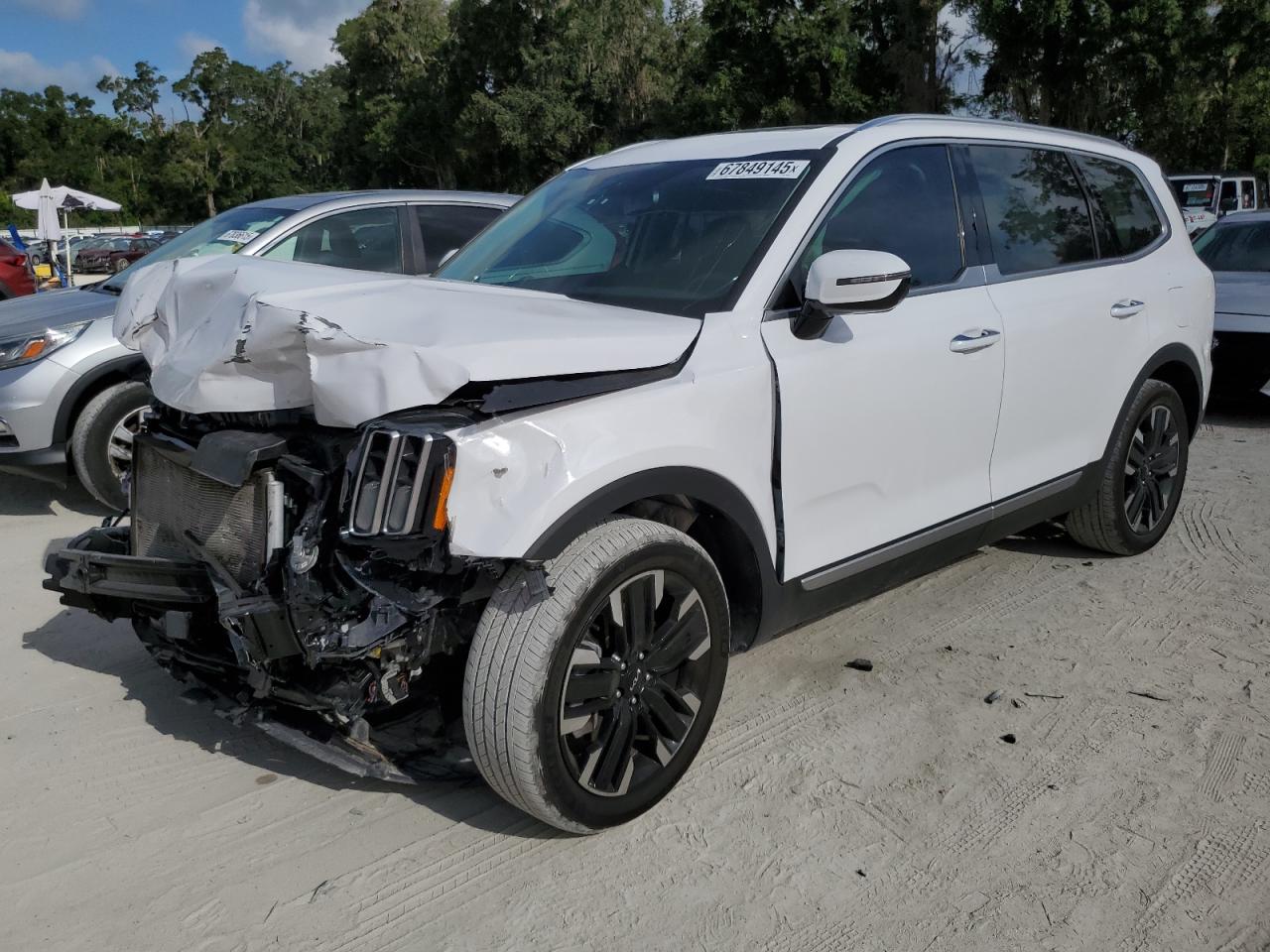 2023 Kia Telluride VIN 5XYP5DGC0PG409952 COPART salvage auction — Front End, FL - CERT OF TITLE SLVG REBUILDABLE, sold $8,000 on 2026-06-30 (photo 1)