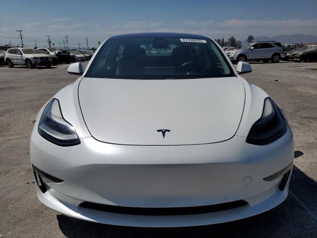 2022 Tesla Model 3 VIN 5YJ3E1EB8NF137548 COPART salvage auction — Minor Dent/Scratches, CA - SALVAGE CERTIFICATE (P), sold $19,500 on 2025-10-24 (photo 5)