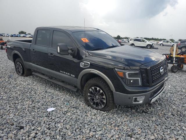 2017 Nissan Titan xd VIN 1N6BA1F48HN567283 COPART salvage auction — ROLLOVER, Fl - Cert Of Ttl-Rebuilt&Slvg Rbld, sold $100 on 2026-07-14 (photo 4)