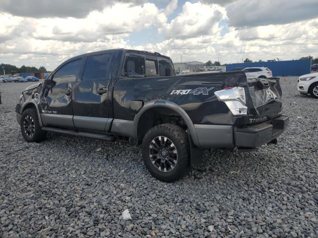 2017 Nissan Titan xd VIN 1N6BA1F48HN567283 COPART salvage auction — ROLLOVER, Fl - Cert Of Ttl-Rebuilt&Slvg Rbld, sold $1,650 on 2026-07-21 (photo 2)