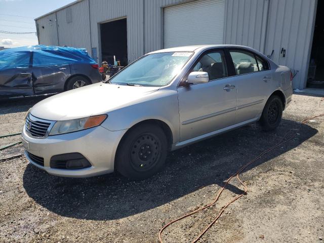 2009 Kia Optima VIN KNAGE228X95323855 COPART salvage auction — FRONT END, Fl - Cert Of Title Slvg Rebuildable, sold $425 on 2026-07-27 (photo 1)