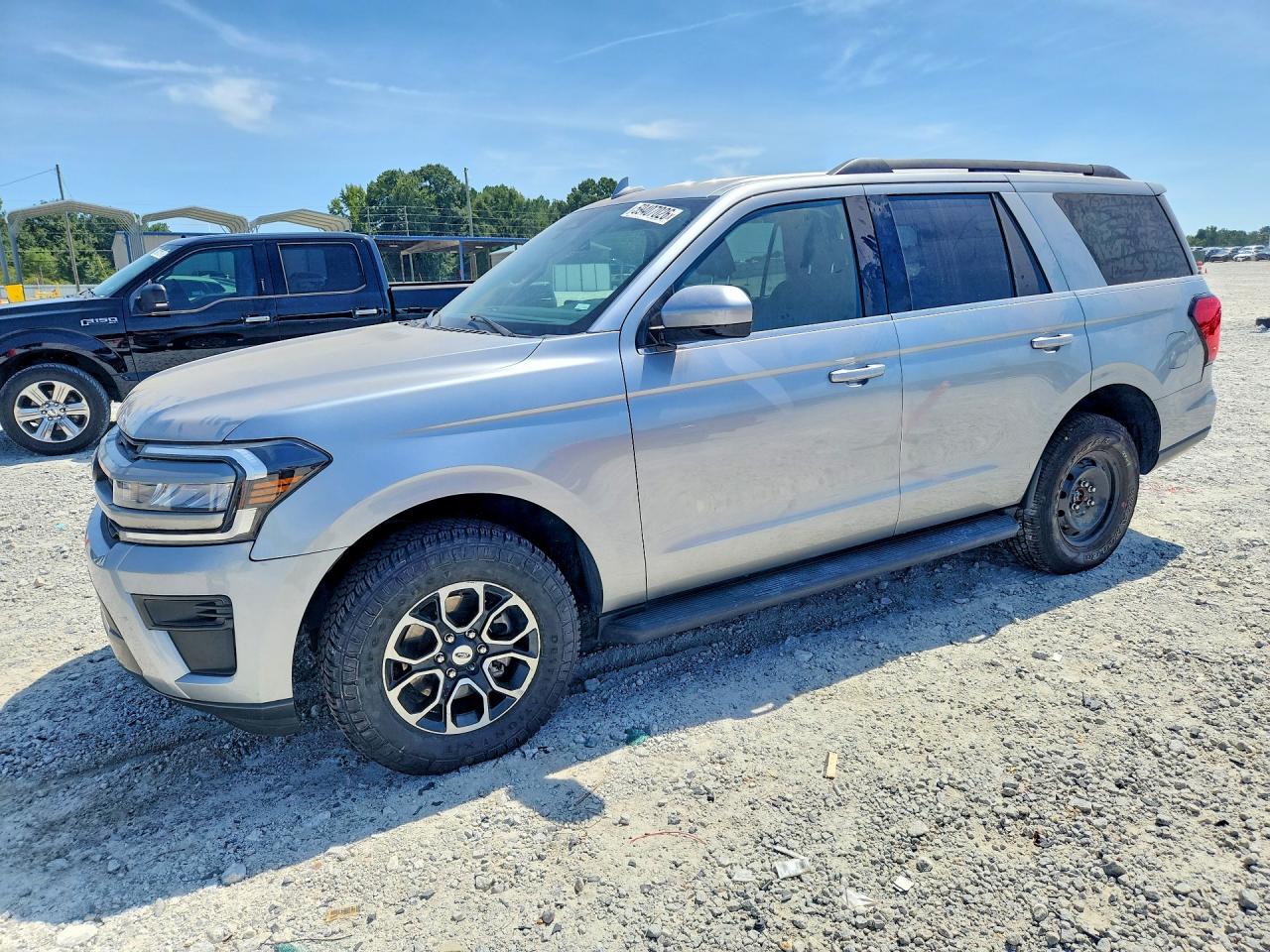 2024 Ford Expedition VIN 1FMJU1H82REA17970 — COPART salvage auction photo