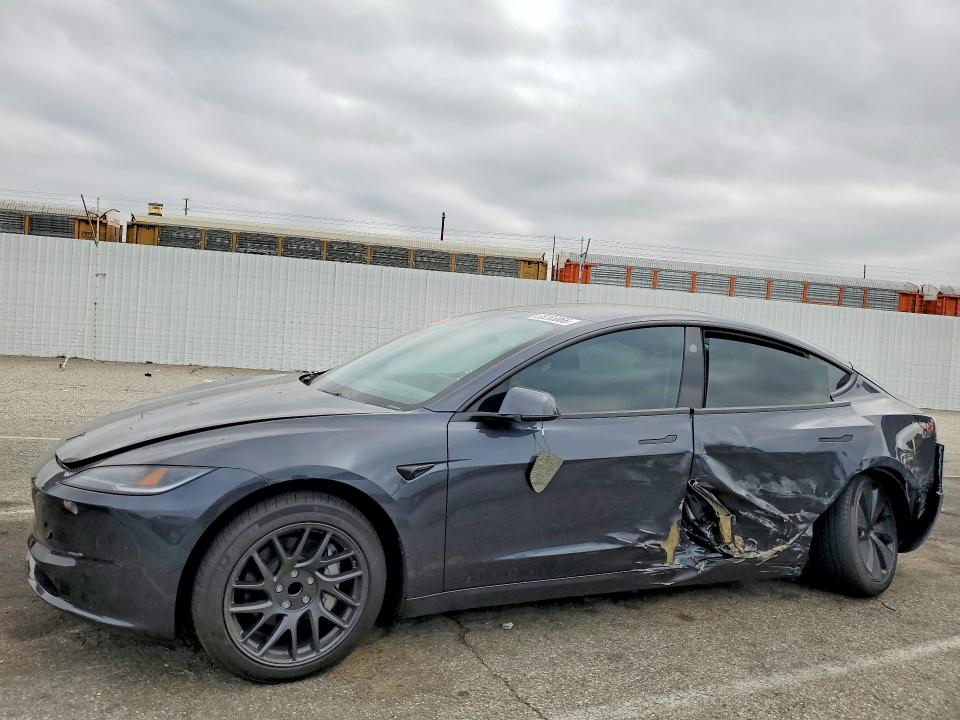 2026 Tesla Model 3 VIN 5YJ3E1EA5TF196402 — COPART salvage auction photo