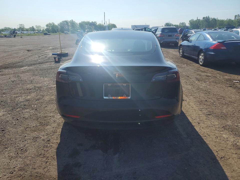 2019 Tesla Model 3 VIN 5YJ3E1EA0KF321336 COPART salvage auction — SIDE, QC - GRAVEMENT ACCIDENTE, sold $7,400 on 2026-09-08 (photo 6)