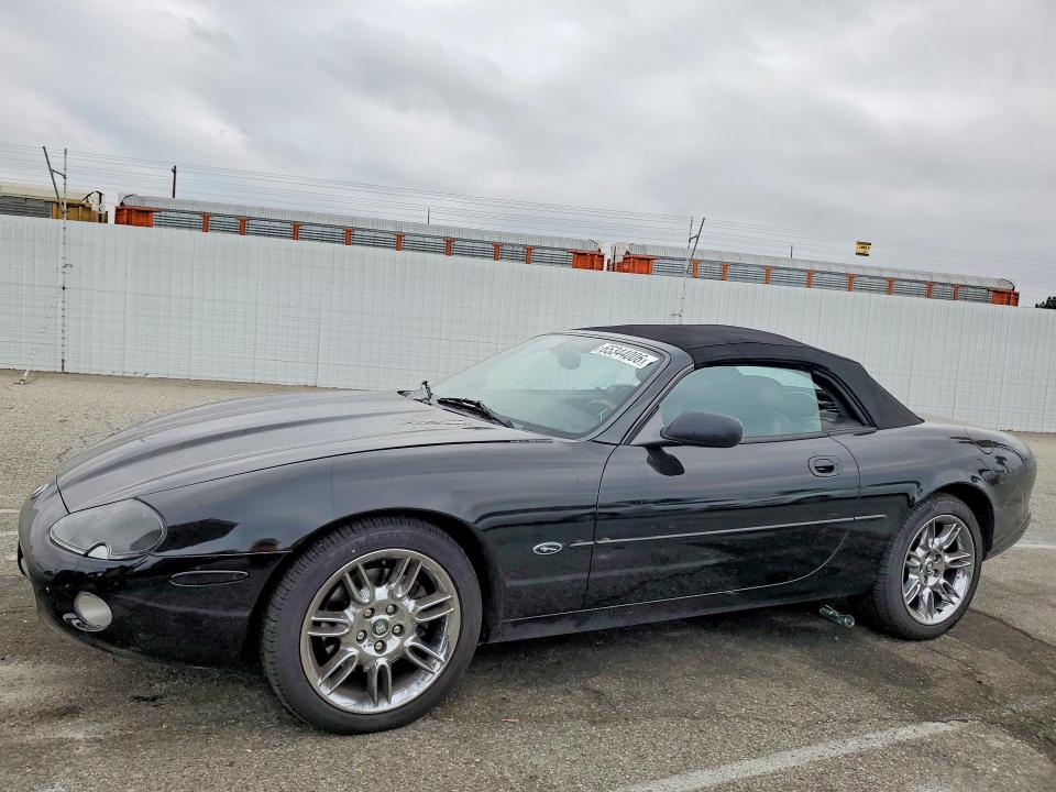 2002 Jaguar XK-Series VIN SAJDA42C72NA23041 COPART salvage auction — SIDE, CA - SALVAGE CERTIFICATE, sold $925 on 2026-09-04 (photo 1)