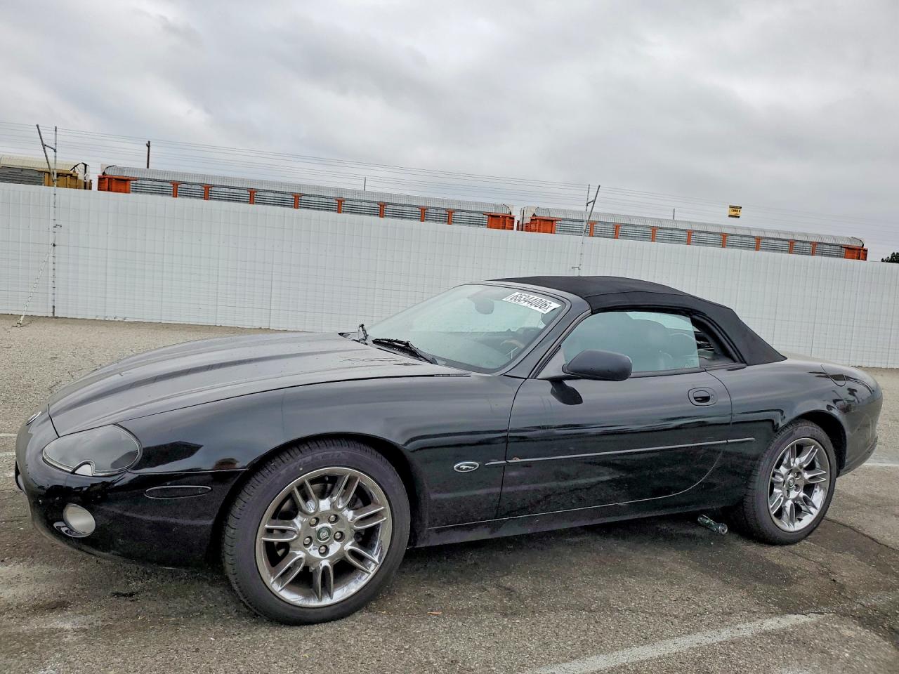 2002 Jaguar XK-Series VIN SAJDA42C72NA23041 COPART salvage auction — Side, CA - SALVAGE CERTIFICATE, sold $1,200 on 2026-09-09 (photo 1)
