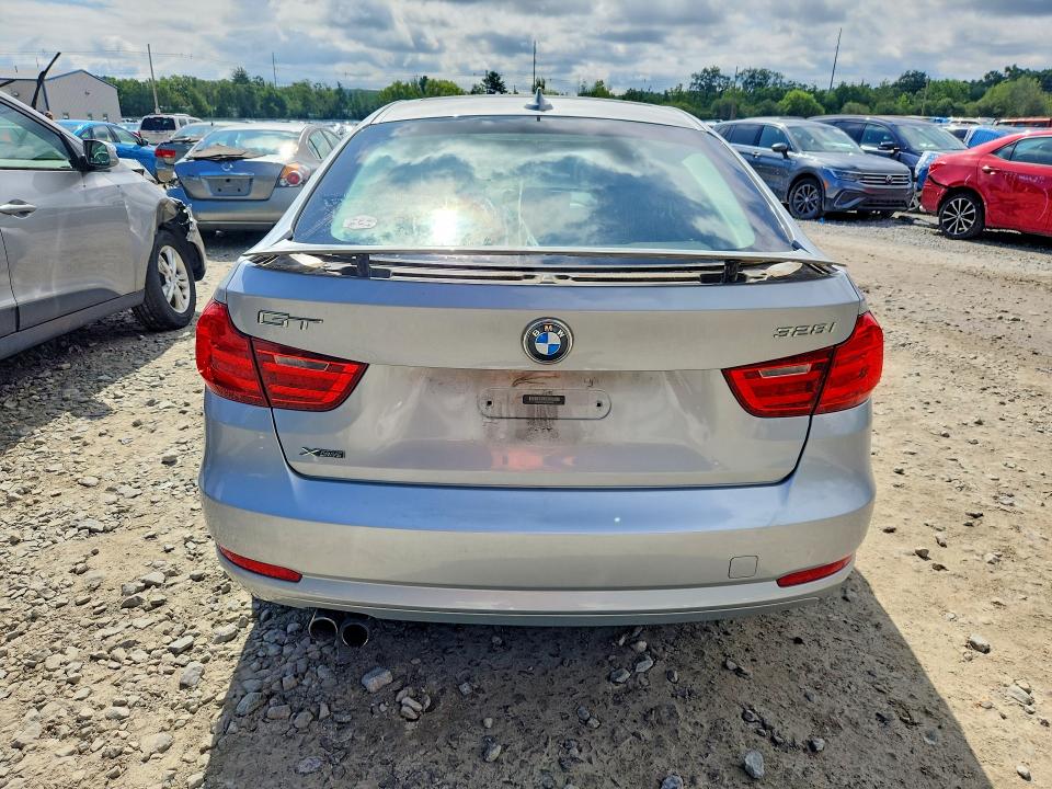 2014 BMW 3er VIN WBA3X5C58ED556826 COPART salvage auction — WATER/FLOOD, Ma - Cert Of Title-Reconstrctd Fld, sold $950 on 2026-08-20 (photo 6)