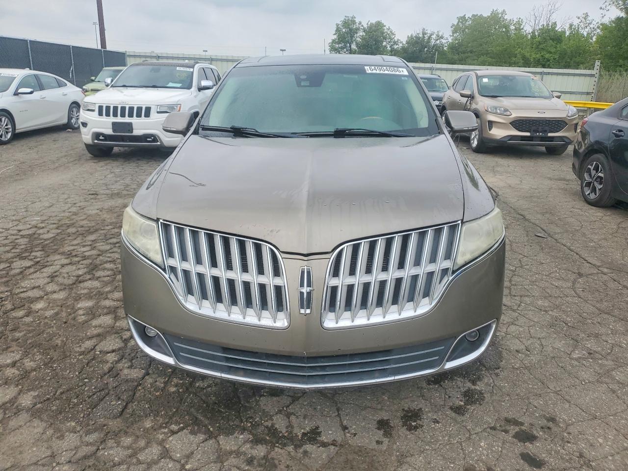 2012 Lincoln MKT VIN 2LMHJ5AT8CBL53224 COPART salvage auction — Minor Dent/Scratches, MI - CERTIFICATE OF TITLE, sold $1,100 on 2026-09-11 (photo 5)