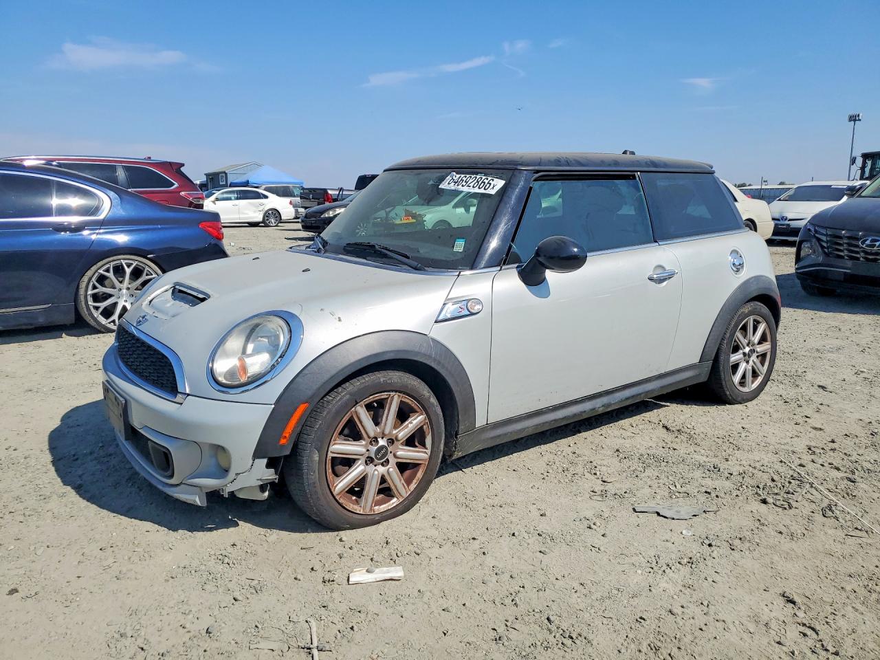 2011 Mini Cooper VIN WMWSV3C58BTY15306 COPART salvage auction — Side, Dv - Clean Title, sold $100 on 2026-08-20 (photo 1)