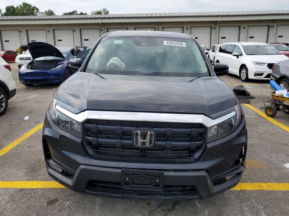 2026 Honda Ridgeline VIN 5FPYK3F5XTB023459 COPART salvage auction — MINOR DENT/SCRATCHES, Fl - Cert Of Title Slvg Rebuildable, sold $19,200 on 2026-08-24 (photo 5)