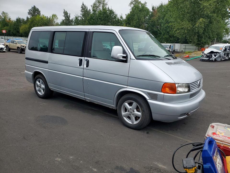 2003 Volkswagen Eurovan VIN WV2KB470X3H038634 COPART salvage auction — MINOR DENT/SCRATCHES, Tx - Salvage Vehicle Title, sold $2,200 on 2026-08-17 (photo 4)