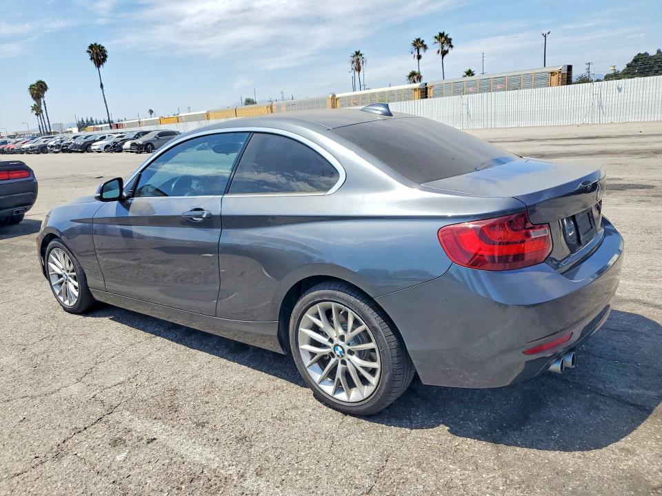 2014 BMW 2er VIN WBA1F5C51EVV98985 COPART salvage auction — NORMAL WEAR, Ca - Dis/Dlr/Exp Only Clean Title, sold $1,700 on 2026-08-20 (photo 2)