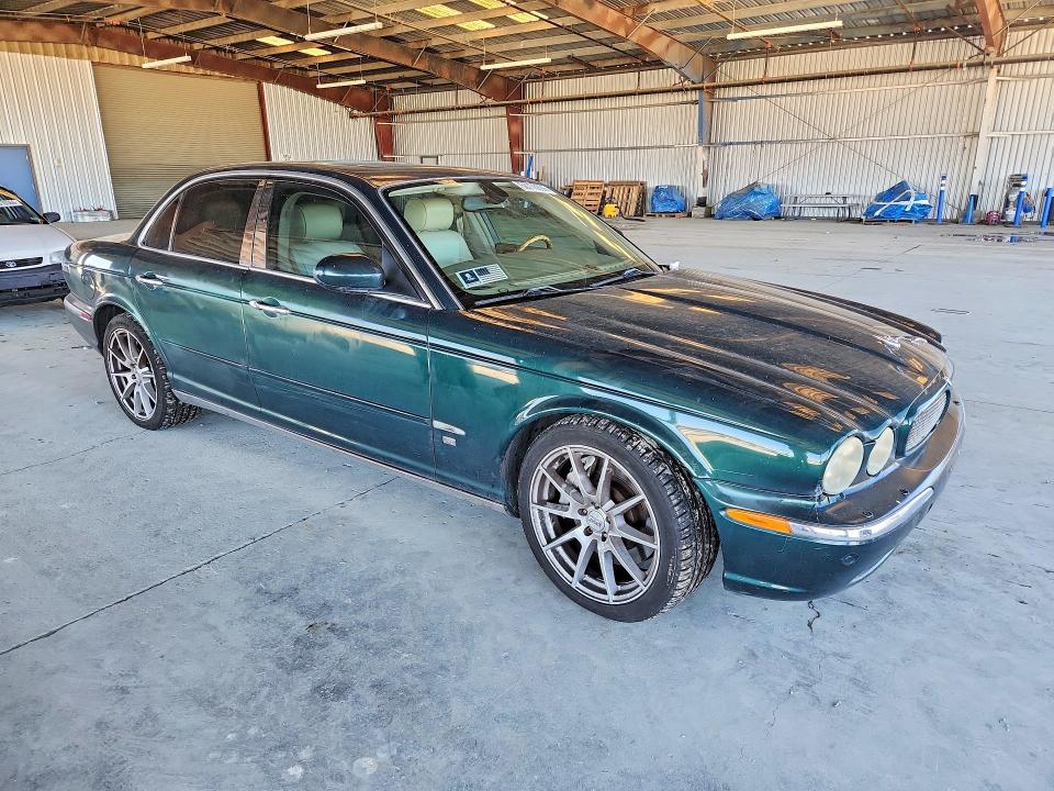2004 Jaguar Xj series VIN SAJWA73B24TG30933 COPART salvage auction — MECHANICAL, CA - DIS/DLR/EXP ONLY CLEAN TITLE, sold $350 on 2026-09-10 (photo 4)